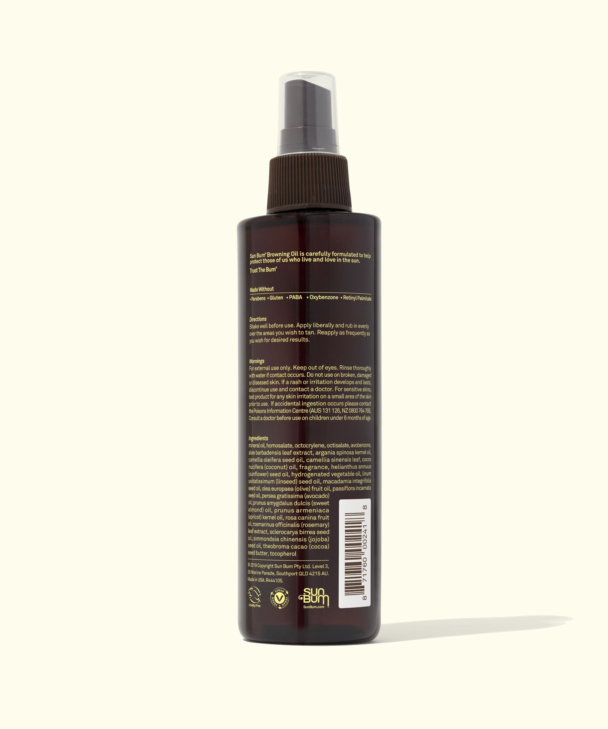 Rear view of SPF 15 Sunscreen Tanning Oil bottle with detailed product information, Sun Bum.