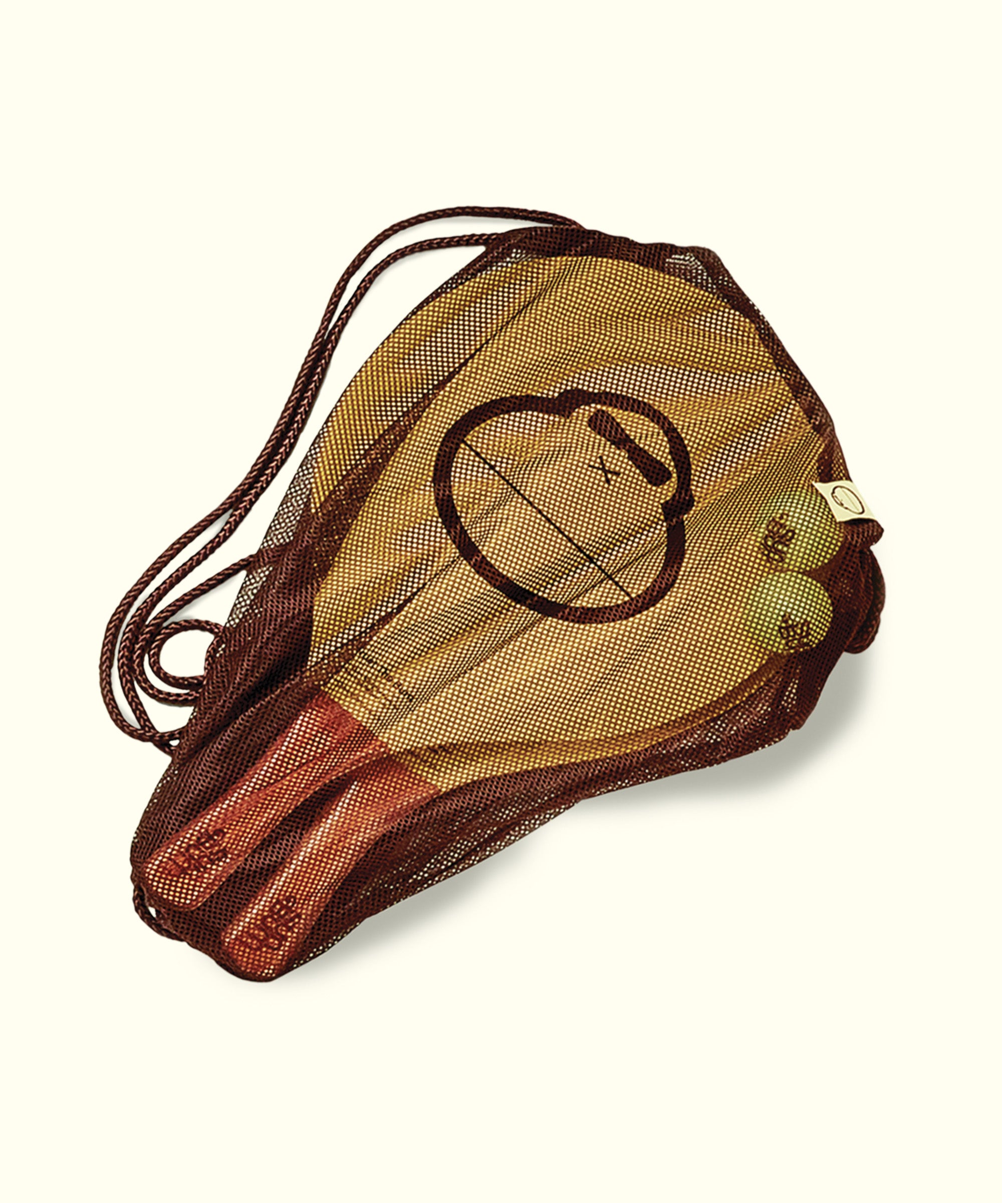 A beige and brown paddleball set with a character illustration, featuring wooden handles and two balls.
