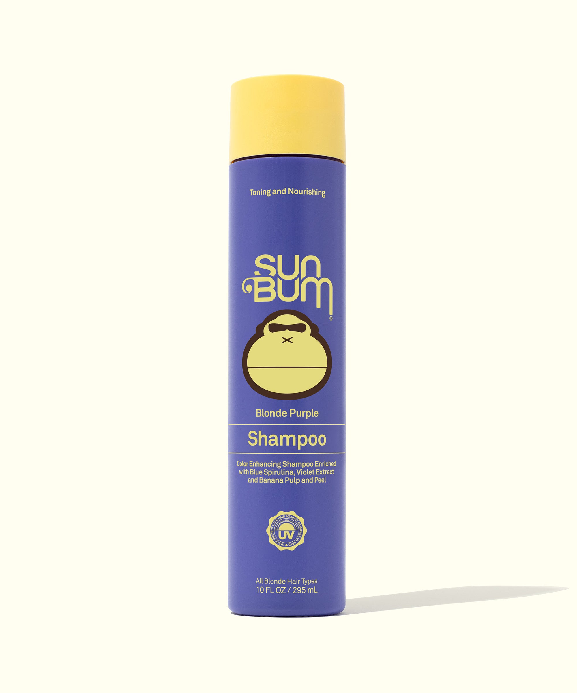 A bottle of Sun Bum Blonde Purple Shampoo with a yellow cap and a label featuring the brand logo and product name.