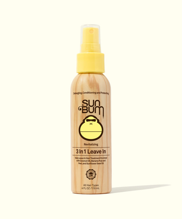 A bottle of Sun Bum 3 in 1 Leave In hair care product with a spray nozzle, indicating its use for hair detangling, conditioning, and protection.