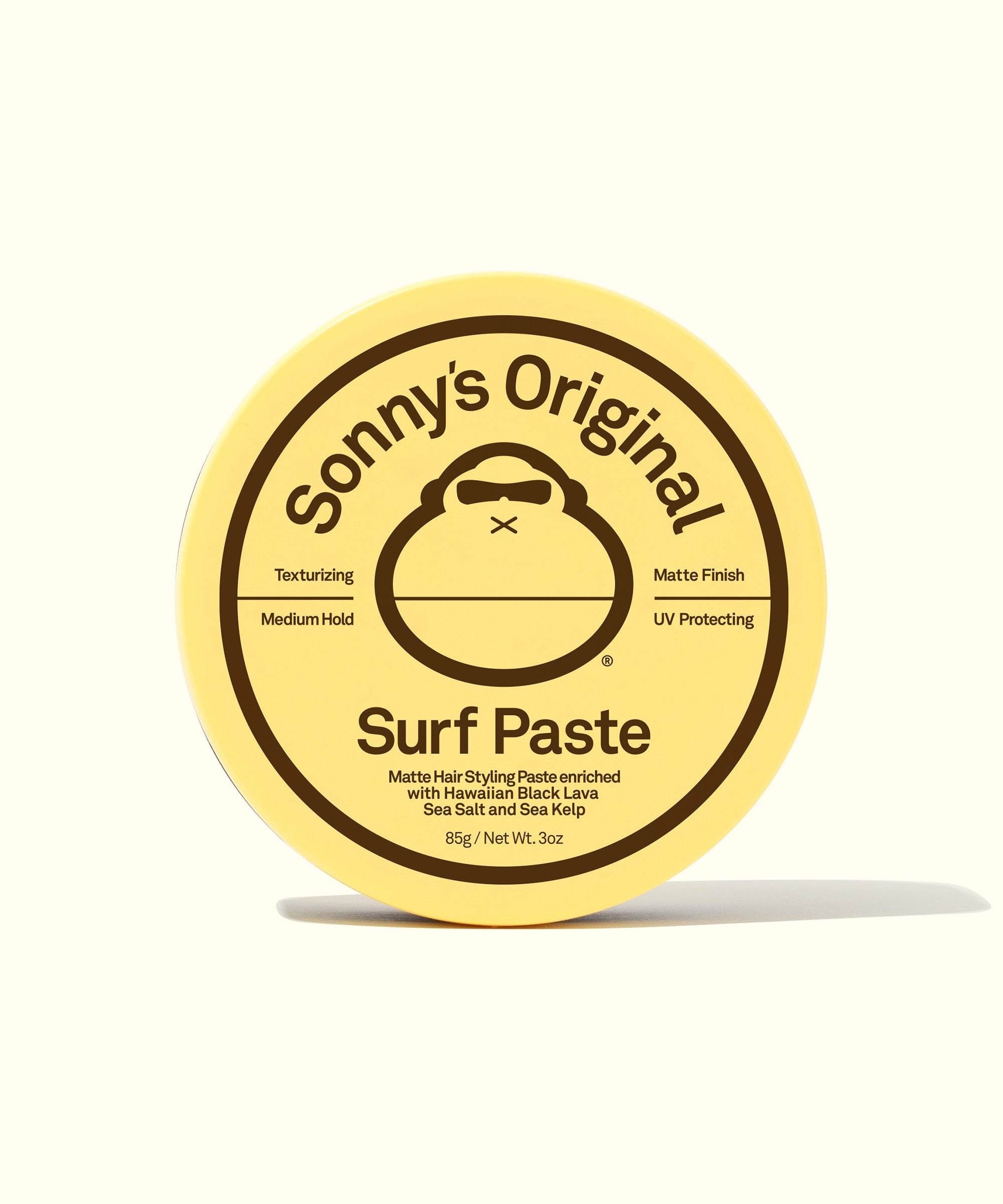 A container of Sonny's Original Surf Paste with the lid showing the product name and description.