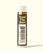 Lip balm with 'Trust The Bum' branding on a white background