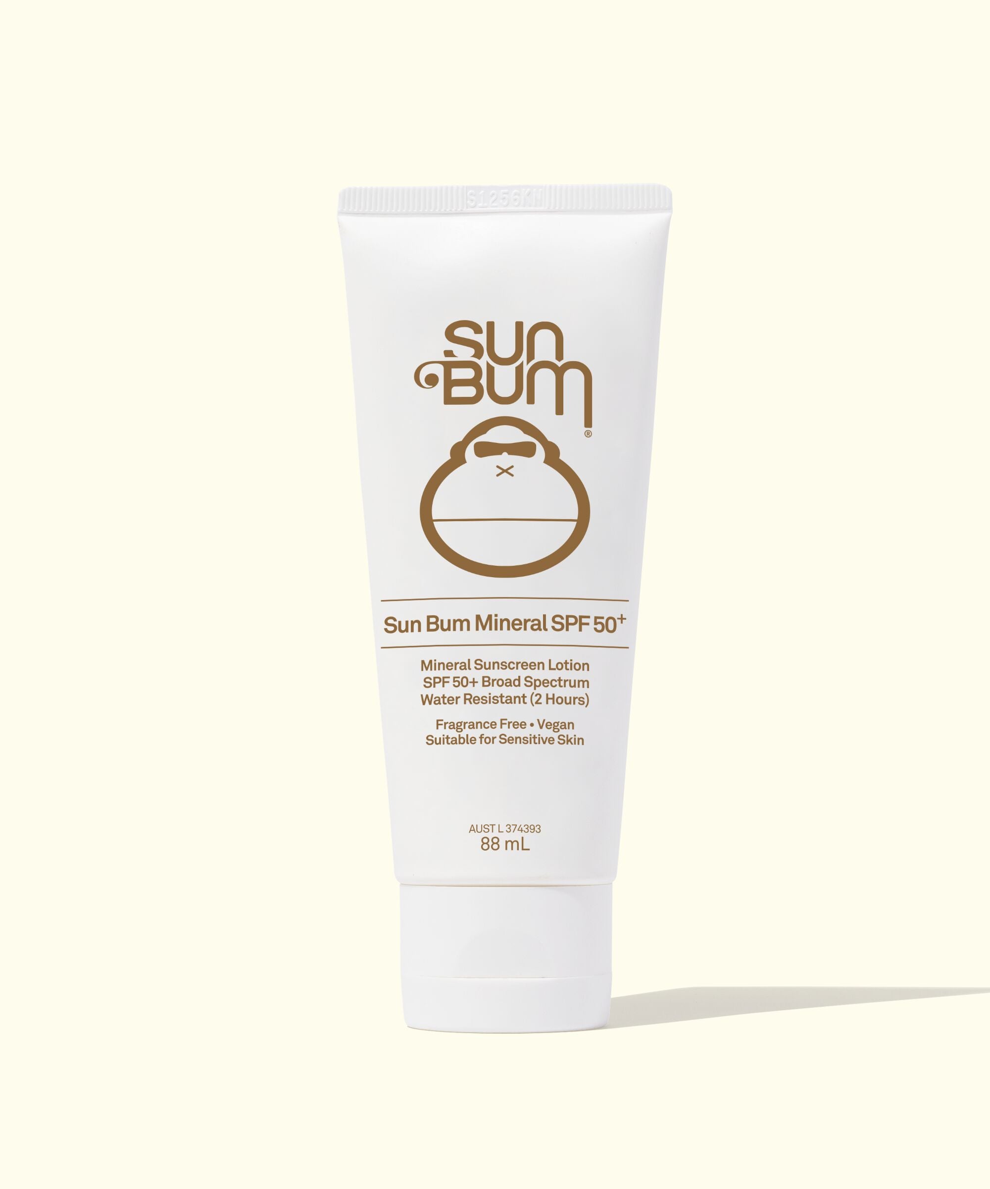 A tube of Sun Bum Mineral SPF 50+ Sunscreen Lotion with a white background. The tube is labeled with the brand and product information.