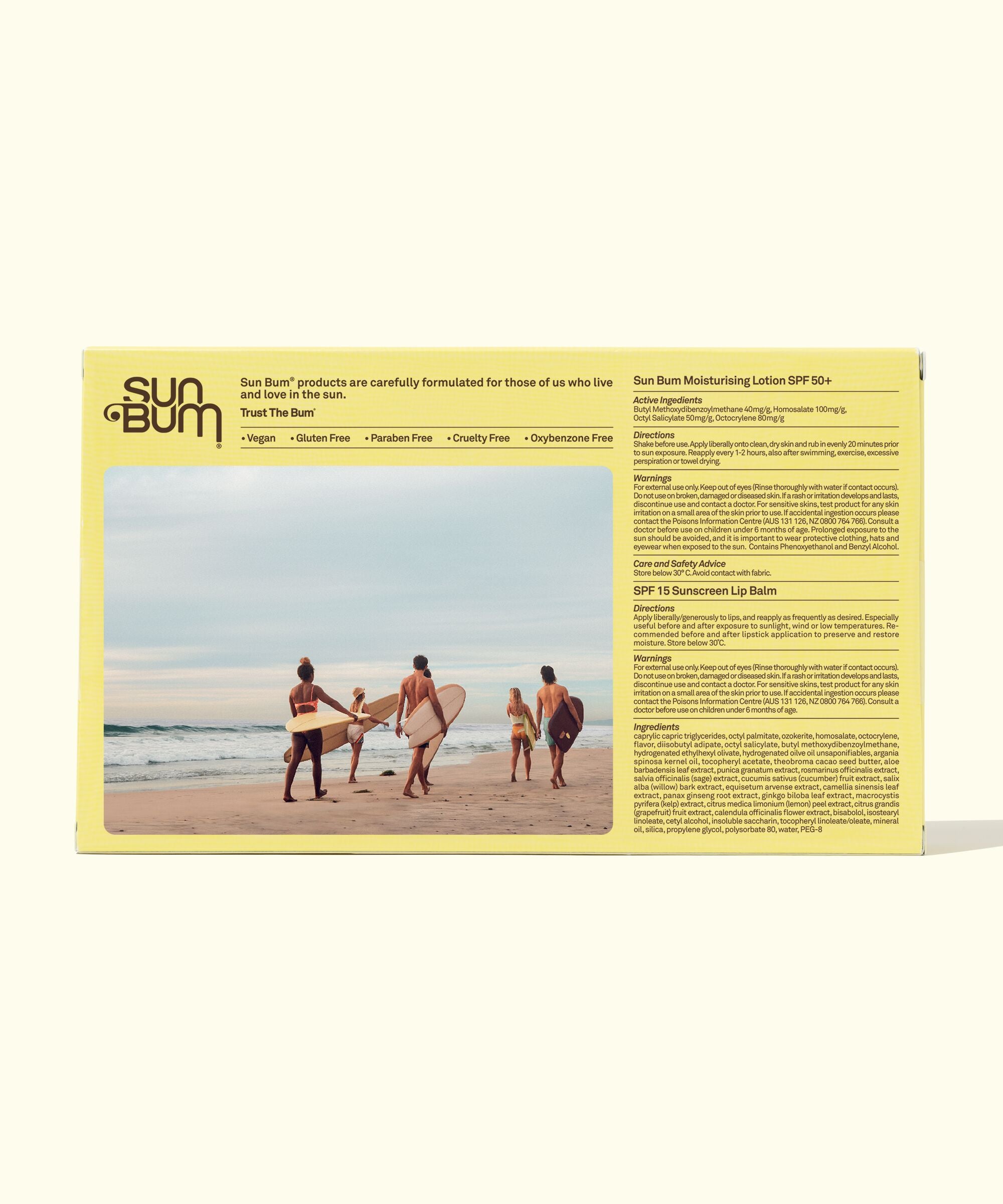 Group of friends with surfboards on a beach, sun care essentials by Sun Bum.