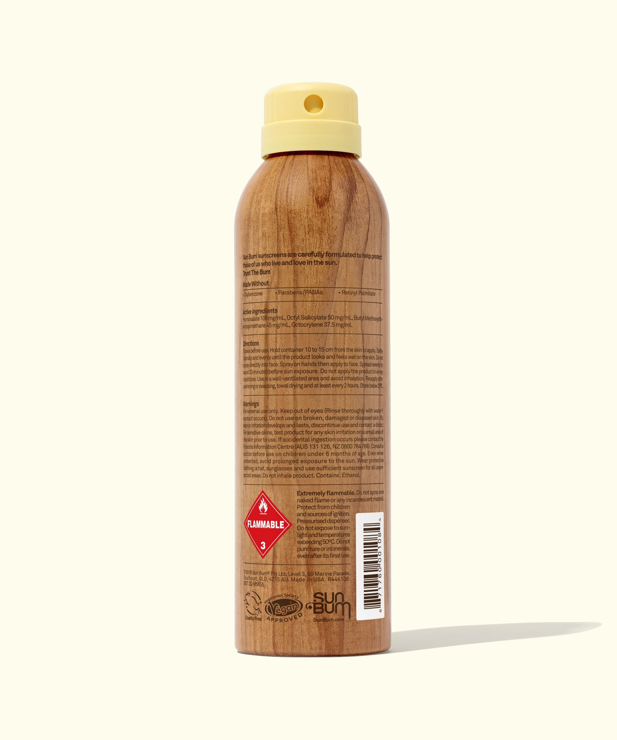Back view of the "Original SPF 50 Sunscreen Spray" showcasing its natural, wood grain design and yellow cap. Provides broad spectrum protection with Vitamin E, using eco-friendly non-aerosol compression. Ideal for beach bags. Sun Bum