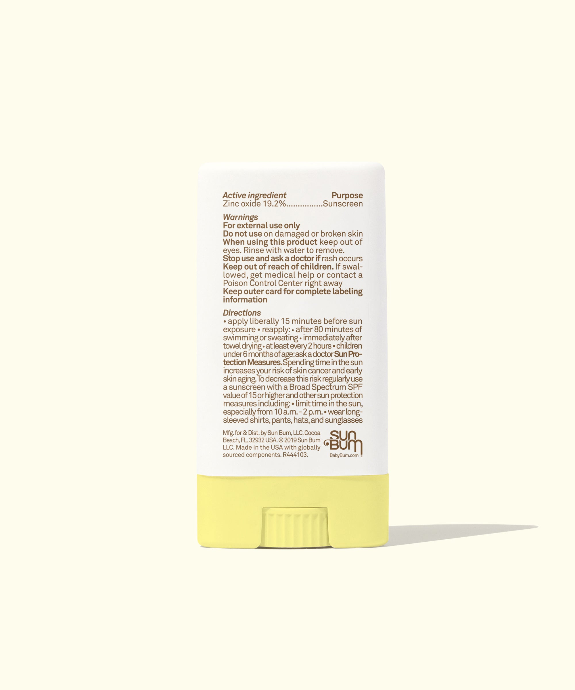Sunscreen stick with label on a white background