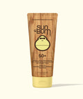 Sun Bum 50+ Premium Moisturizing Sunscreen Lotion in a 177 mL squeeze tube with a wood-grain pattern and a pale yellow cap, shown on a light cream background.