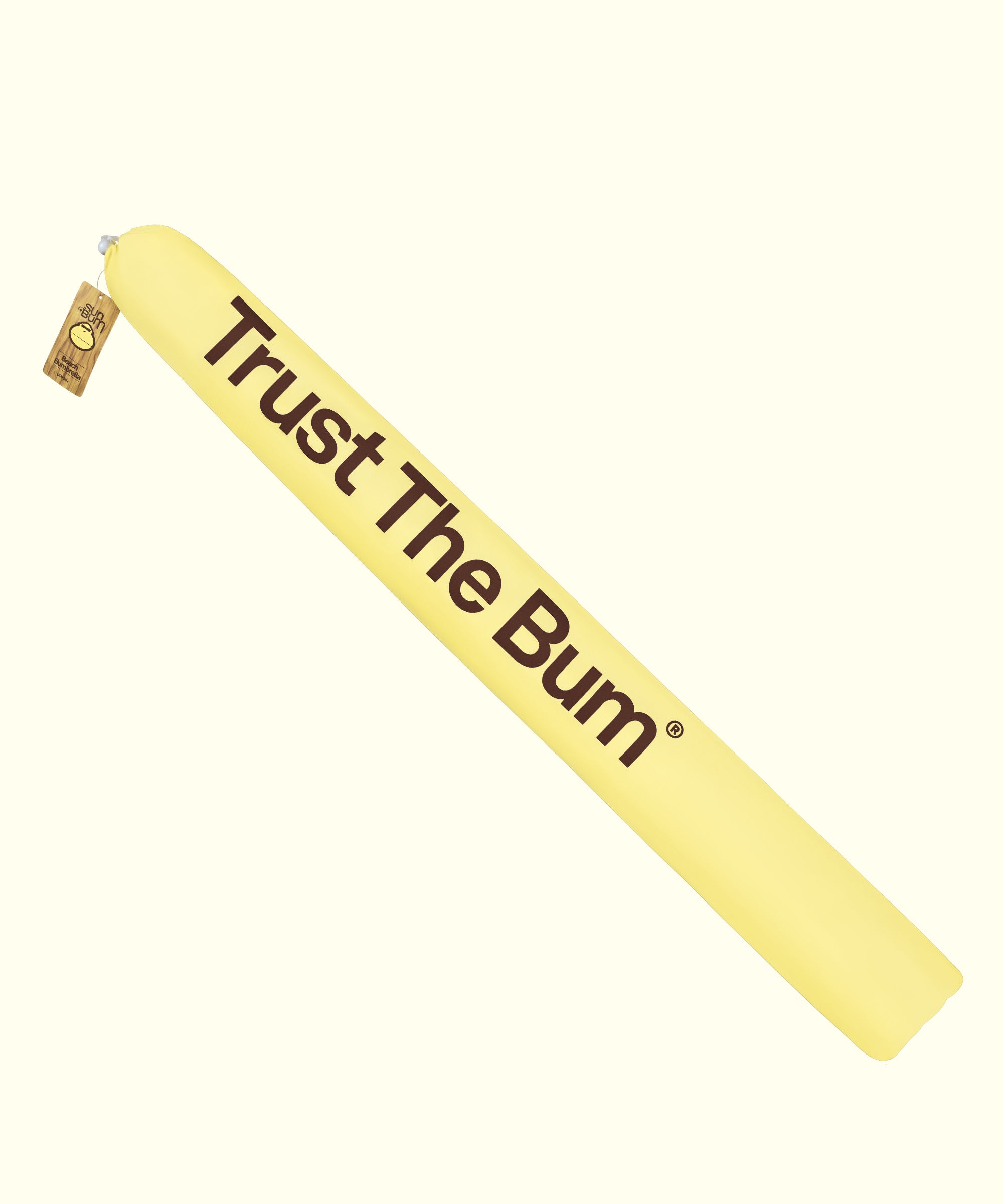Bumbrella beach umbrella in yellow with "Trust The Bum" branding for sun protection. Sun Bum.