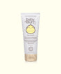A tube of Baby Bum Natural Monoi Coconut Balm with a white body and a smiling sun logo at the top. The packaging indicates that the product is hypoallergenic and gluten-free.