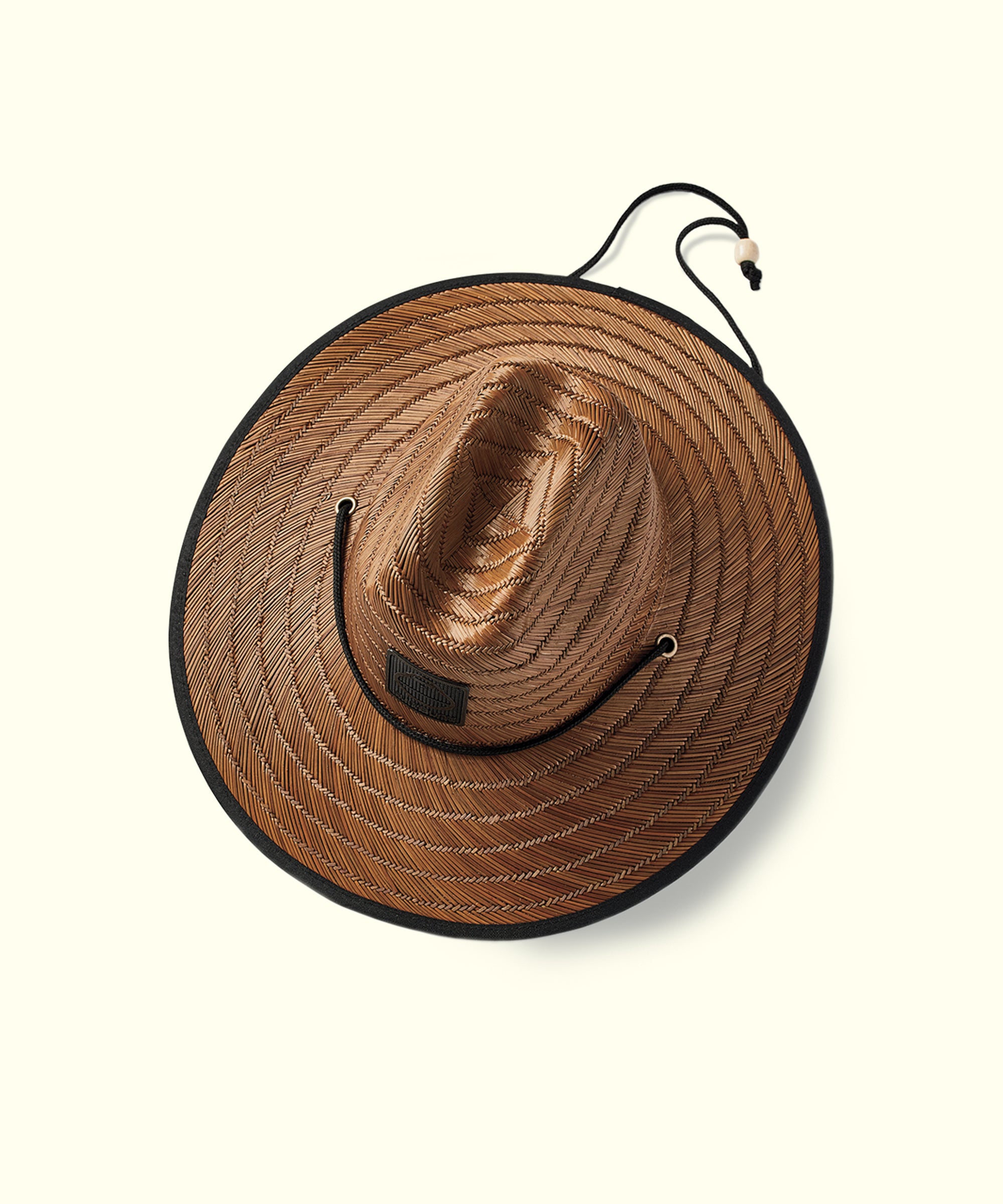 A brown lifeguard hat with a black strap and buckle, designed for sun protection.